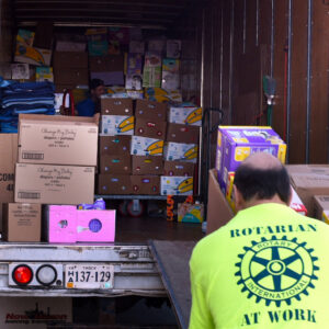 rotarian at work moving boxes