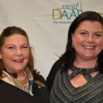Dulles Area Association of Realtors members smiling for a photograph for their award ceremony
