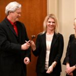 Dulles Area Association realtors sharing the award gavel