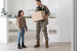 military man with a box