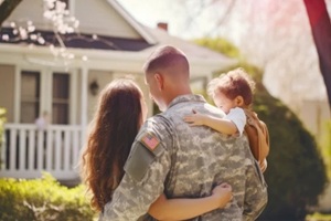 us army soilder with family moving to the new house